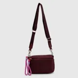 Bolso compacto Bubba modelo Purse Ontario, color bordó, con compartimento principal con cierre, bolsillo interior y correa ajustable. Incluye tiradores de cordón en color lila y rosa.