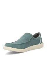Zapato tipo slip on color verde con suela de goma EVA en tono beige y detalles elásticos en los laterales para mayor comodidad.