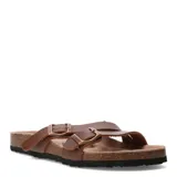 Sandalias de dos tiras ajustables con hebillas metálicas, confeccionadas con base de corcho y suela antideslizante.