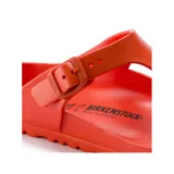Sandalias Birkenstock modelo Gizeh, color naranja, fabricadas en material EVA, con tira entre los dedos y hebilla ajustable.