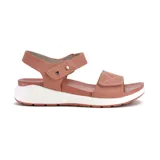 Sandalias bajas color salmón con plataforma blanca y doble tira con velcro.