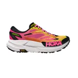 Championes de trail running Hoka modelo Mafate X, con diseño vibrante en tonos fucsia, amarillo y detalles en negro. Presentan una entresuela blanca robusta con tecnología Vibram para mayor tracción y logo de la marca en el lateral.