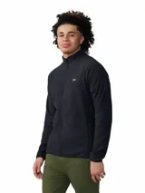 Campera polar de hombre Mountain Hardwear modelo Microchill Full Zip, color negro, con cierre frontal completo, cuello alto y bolsillos laterales con cierre. Confeccionada en poliéster reciclado, cuenta con mangas raglán y logo bordado en el pecho.