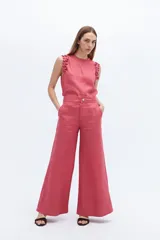 Pantalón palazzo color rosado de lino.