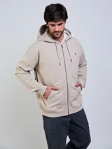 Campera con capucha Volcom modelo Lowtone, color beige, con cierre frontal completo, cordones ajustables y pequeño logo bordado en el pecho.