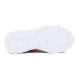 Championes de running Avia Factor W, color durazno con suela blanca.
