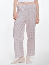 Pantalón de dormir de corte recto y calce relajado, confeccionado en popelina de algodón con estampado de rayas verticales y pequeños puntos bordados. Presenta cintura elastizada para mayor comodidad.