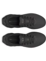 Championes de running Under Armour modelo Ascend, color negro. Presentan una parte superior de malla liviana y transpirable con refuerzos sintéticos, y una entresuela Charged Cushioning para mayor amortiguación y respuesta.