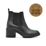 Bota corta de cuero negro con elástico lateral, taco cuadrado y suela track.