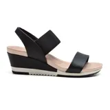 Sandalias con plataforma de Korium Confort, color negro con base beige y suela blanca.