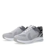 Championes deportivos unisex marca Push, color gris claro con detalles en gris oscuro y negro. Presentan un diseño de tejido transpirable, cordones planos y suela blanca con base gris.