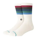 Medias de caña media Stance, color blanco con franjas horizontales en la parte superior en tonos rojo, negro, verde y azul. Presentan el logo de la marca bordado en el lateral y detalle de línea azul en la puntera.