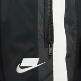 Pantalón deportivo Nike de corte ajustado, color negro con franjas laterales blancas. Cuenta con cintura elástica con cordón de ajuste, bolsillos laterales con cierre y logo de la marca estampado en el muslo.