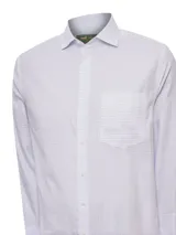 Camisa de manga larga RKF con estampado de cuadrícula fina en tonos azules sobre fondo blanco. Presenta cuello italiano, cierre frontal con botones y un bolsillo en el pecho con el logo de la marca bordado.
