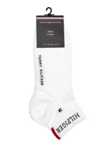 Medias tobilleras blancas Tommy Hilfiger con la palabra "Hilfiger" y el logo de la marca bordados en negro.