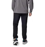 Pantalón Columbia de corte recto, color negro, con tecnología Omni-Shield que repele la humedad y las manchas. Cuenta con trabillas para cinturón, bolsillos laterales para las manos, bolsillo de seguridad con cremallera y bolsillos traseros con cierre a presión. Incluye detalles reflectantes en tobillos y cintura.