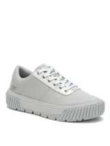 Sneakers grises Caterpillar modelo Amp Canvas, confeccionados con capellada de lona recubierta en poliuretano, detalles plateados texturizados en la zona de los cordones y suela de goma tipo plataforma con ranuras.
