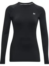 Remera térmica de manga larga Under Armour, diseñada como primera capa. Presenta un ajuste al cuerpo, cuello redondo y mangas raglán. Confeccionada en tejido de doble capa con interior cepillado para mayor calidez y exterior de secado rápido, incluye paneles de malla en las axilas para ventilación.