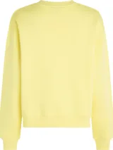 Buzo de cuello redondo Tommy Hilfiger color amarillo pastel, confeccionado en mezcla de algodón y poliéster. Presenta hombros caídos, puños y bajo de punto canalé, con el logo de la marca estampado en el pecho y bordado en la manga.