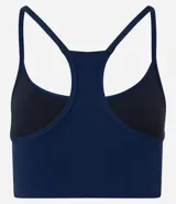Top deportivo de poliamida color azul marino, con breteles finos y espalda estilo nadador.