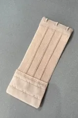 Extensor de contorno de soutien negro con tres ganchos, 15 cm de largo por 6 cm de ancho.