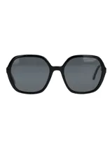 Lentes de sol RKF modelo Bolonia, con armazón de acetato de celulosa negro de diseño cuadrado y lentes oscuros polarizados con protección UV.