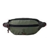 Riñonera Rip Curl de 1.5 litros, diseño empacable en color verde oliva con detalles en negro y estampado de cuadrícula. Cuenta con cierre frontal y correa ajustable.