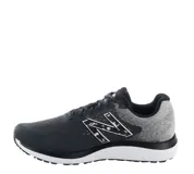 Championes de running New Balance Fresh Foam 680 V7, color negro con detalles en gris y blanco, con logo "N" característico en los laterales y entresuela Fresh Foam.