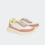 Championes Hey Dude modelo Sirocco Alta W Colorblock en color verde menta con detalles en amarillo y lila. Presentan una parte superior de nailon con puntera y talón de gamuza sintética, entresuela de EVA blanca y suela de goma ligera. Incluyen cordones elásticos, cuello acolchado y presilla en el talón para facilitar el calce.