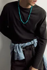 Camiseta relaxed fit de manga larga y cuello redondo de la colección Aaron Levine x Zara.