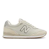 Championes New Balance modelo WLSLAKD1, color beige con detalles plateados y suela de goma marrón. Confeccionados en tela y gamuza, con el logo "N" en los laterales.