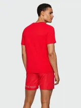 Remera rosa de algodón con corte slim fit y logo "BOSS" estampado en el pecho.