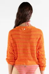 Sweater italiano de punto abierto y calado, con diseño a rayas en tonos de naranja, mangas largas y corte corto.