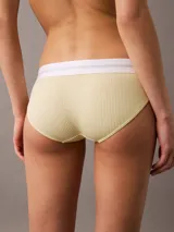 Bombacha clásica Calvin Klein de algodón modal acanalado color amarillo pálido, con cintura elástica blanca con logo.