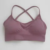 Top deportivo color lila, con breteles finos y espalda deportiva.