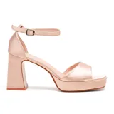 Sandalias de vestir Korium color blanco, con plataforma y taco cuadrado alto.