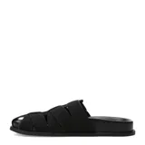 Zuecos de mujer estilo romano color negro, confeccionados con tiras cruzadas en el empeine y una hebilla metálica de ajuste lateral. Presentan suela plana y diseño descubierto en los talones.