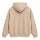 Canguro con capucha de calce oversize, confeccionado en tejido pesado color gris claro. Presenta un bordado minimalista con la palabra 'ASCEND' en la parte superior trasera, puños y ruedo acanalados.