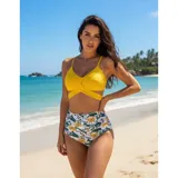 Conjunto de bikini de dos piezas de la marca Uniteduy, compuesto por un crop top amarillo liso con diseño cruzado y tirantes finos, y una bombacha de tiro alto con estampado floral y de hojas en tonos amarillos, verdes y blancos.
