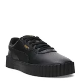 Championes Puma modelo Carina 3.0 Animal Flair, de diseño urbano con plataforma. Presentan una capellada de cuero sintético negro con el logo de la marca en dorado y suela de goma robusta con textura acanalada.