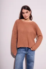 Sweater celeste de tejido de punto calado con lurex, de corte holgado y mangas largas.