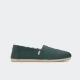 Alpargatas Toms Heritage color verde con suela beige.