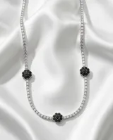 Gargantilla de plata 925 tipo riviere, con engaste de circonias blancas y tres apliques circulares con circonias negras.
