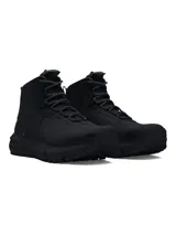 Botas tácticas Under Armour modelo Charged Valsetz Mid, color negro, con parte superior sintética transpirable y refuerzos de PU. Cuentan con entresuela Charged Cushioning para amortiguación y suela exterior Vibram XS Trek para mayor tracción y durabilidad.
