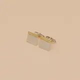 Gemelos cuadrados en plata 925 con detalles en oro.