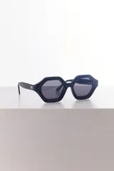 Lentes de sol negros con forma hexagonal y lentes polarizadas con protección UV400.