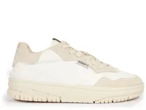 Zapatillas urbanas Schutz modelo Sky, color blanco y beige, con suela chunky y logo en el lateral.