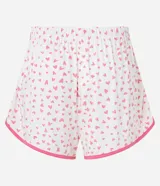 Short de pijama blanco con estampado de corazones rosas y ribete rosa.