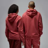 Hoodie de felpa color coral, con capucha, bolsillo frontal tipo canguro, mangas largas y logo Jumpman bordado en el pecho.