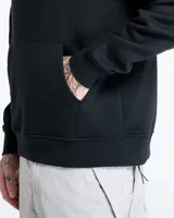 Buzo hoodie negro de la marca Nike Jordan, con logo Jumpman bordado en blanco en el pecho y bolsillo tipo canguro.